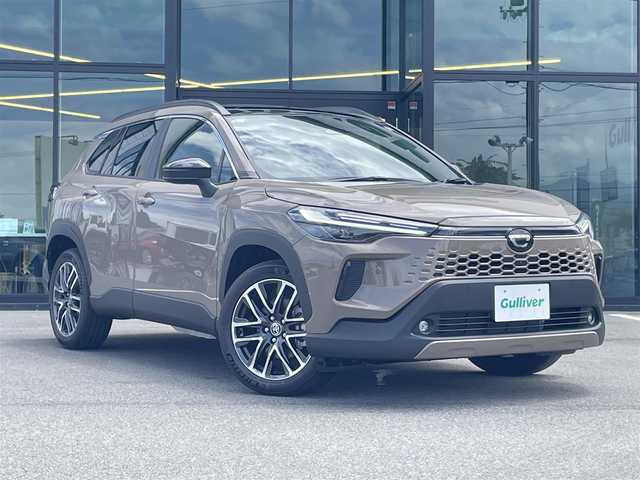トヨタ カローラ クロス ハイブリッド Z 愛媛県 2025(令7)年 0.1万km未満 茶 パノラミックルーフ/プリクラッシュセーフティ/レーントレーシング/ブラインドスポットモニター/レーダークルーズコントロール/クリアランスソナー /純正10.5インチディスプレイオーディオ(ナビ付)/Bluetooth/USB/フルセグTV/全周囲/バックカメラ/ビルトインETC2.0/ハーフレザーシート/シートヒーター/シートベンチレーション/D席パワーシート/LEDヘッドライト/置くだけ充電/オートライト/プッシュスタート/純正18インチAW/オート電動格納ミラー