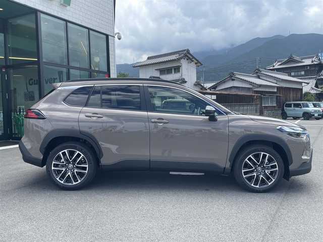 トヨタ カローラ クロス ハイブリッド Z 愛媛県 2025(令7)年 0.1万km未満 茶 パノラミックルーフ/プリクラッシュセーフティ/レーントレーシング/ブラインドスポットモニター/レーダークルーズコントロール/クリアランスソナー /純正10.5インチディスプレイオーディオ(ナビ付)/Bluetooth/USB/フルセグTV/全周囲/バックカメラ/ビルトインETC2.0/ハーフレザーシート/シートヒーター/シートベンチレーション/D席パワーシート/LEDヘッドライト/置くだけ充電/オートライト/プッシュスタート/純正18インチAW/オート電動格納ミラー