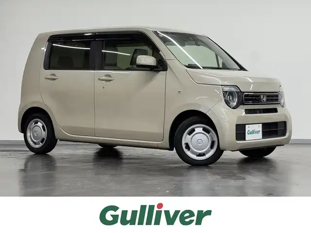ホンダ Ｎ ＷＧＮ Lターボ ホンダセンシング 三重県 2020(令2)年 3.3万km プレミアムアイボリーパールⅡ ガソリン・ターボ/FF/MTモード付インパネCVT/純正 7インチナビ VXM-204VFi/（CD/DVD/FM/AM/TV/iPod/SD/Music Rack/USB/Bluetooth/AUX）/バックカメラ/ドライブレコーダー 前後/ビルトイン ETC/Honda SENSING/・衝突軽減ブレーキ［CMBS］/・車線維持支援システム［LKAS］/・アダプティブクルーズコントロール［ACC］/・路外逸脱抑制機能/・先行車発進お知らせ機能/・標識認識機能/・パーキングセンサーシステム/・オートハイビーム機能/・装備）/・オートエアコン/・オートライト/・LEDヘッドライト/・パドルシフト/・電子パーキングブレーキ＆ブレーキホールド機能/・USBジャック（充電用x2）/・電動格納ドアミラー（ウインカー付）/・14インチスチールホイール＆純正ホイールキャップ/・スマートキーx1/・保/取/ナビ取/など