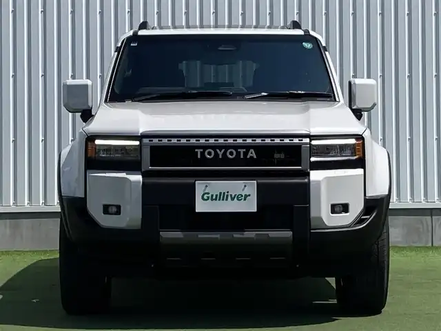 トヨタ ランドクルーザー ２５０ VX 香川県 2024(令6)年 0.1万km プラチナホワイトパールマイカ トヨタセーフティーセンス/・プリクラッシュ/・LTA/トヨタチームメイトADドライブ（OP）/緊急操舵支援/フロントクロストラフィックアラート/レーンチェンジアシスト/純正12.3インチDA/床下透過パノラミックビュー/プレミアムサウンド10スピーカー/電動ムーンルーフ/レザーシート/シートヒーター/ベンチレーション/パワーシート/革巻きステアリング/ステアリングヒーター/ステアリングリモコン/レーダークルーズ/LEDライト/パワーバックドア/デジタルインナーミラー/スマートキー/プッシュスタート