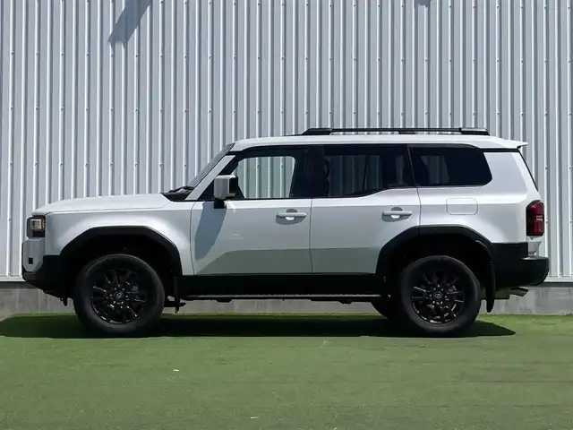 トヨタ ランドクルーザー ２５０ VX 香川県 2024(令6)年 0.1万km プラチナホワイトパールマイカ トヨタセーフティーセンス/・プリクラッシュ/・LTA/トヨタチームメイトADドライブ（OP）/緊急操舵支援/フロントクロストラフィックアラート/レーンチェンジアシスト/純正12.3インチDA/床下透過パノラミックビュー/プレミアムサウンド10スピーカー/電動ムーンルーフ/レザーシート/シートヒーター/ベンチレーション/パワーシート/革巻きステアリング/ステアリングヒーター/ステアリングリモコン/レーダークルーズ/LEDライト/パワーバックドア/デジタルインナーミラー/スマートキー/プッシュスタート