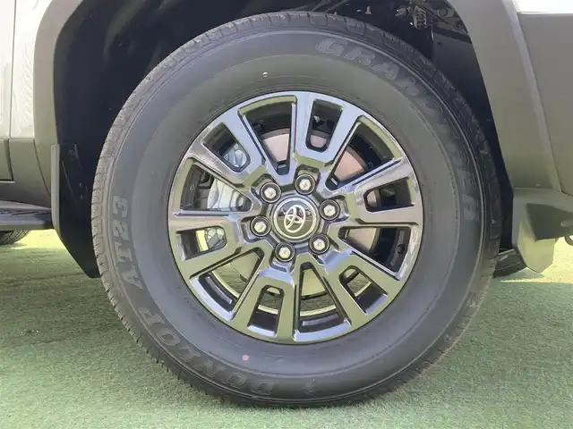 トヨタ ランドクルーザー ２５０ VX 香川県 2024(令6)年 0.1万km プラチナホワイトパールマイカ トヨタセーフティーセンス/・プリクラッシュ/・LTA/トヨタチームメイトADドライブ（OP）/緊急操舵支援/フロントクロストラフィックアラート/レーンチェンジアシスト/純正12.3インチDA/床下透過パノラミックビュー/プレミアムサウンド10スピーカー/電動ムーンルーフ/レザーシート/シートヒーター/ベンチレーション/パワーシート/革巻きステアリング/ステアリングヒーター/ステアリングリモコン/レーダークルーズ/LEDライト/パワーバックドア/デジタルインナーミラー/スマートキー/プッシュスタート