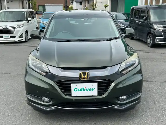 ホンダ ヴェゼル ハイブリッド X 静岡県 2014(平26)年 5.9万km ミスティックグリーンパール エンジンスタートボタン/パワーステアリング/パワーウィンドウ/MTモード付きAT/寒冷地仕様/スマートキー/クルーズコントロール/CDチェンジャー/ETC/バックカメラ/走行中視聴可能フルセグTV/DVD再生機能ありSDナビ/前方ドライブレコーダー/純正フロアマット/D+N席シートヒーター/純正アルミホイール/ABS/横滑り防止装置/前方コーナーセンサー/オートライト/W+サイドエアバック/衝突軽減システム/カーテンエアバック/LEDヘッドライト/オートブレーキホールド