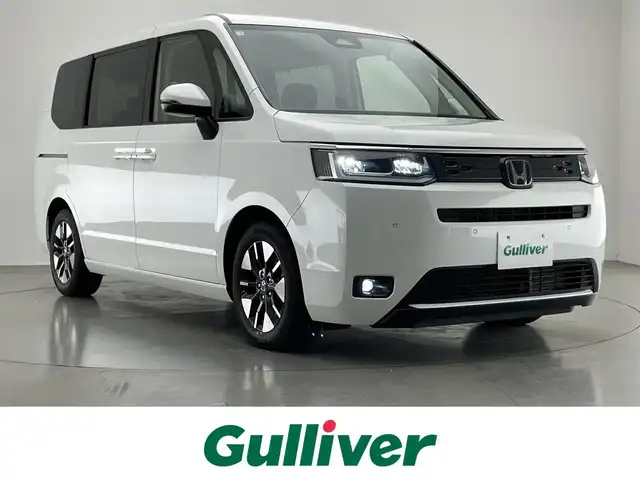 ホンダ ステップワゴン eHEV エアー 愛知県 2023(令5)年 0.9万km プラチナホワイトパール 純正８型ナビ　両側パワスラ　禁煙　ホンダセンシング　バックカメラ　フルセグ　ＤＶＤ　ドラレコ　ＥＴＣ　両側パワスラ　衝突軽減　レーンキープ　誤発進抑制　ＬＥＤオートライト　純正ＡＷ　プッシュスタート