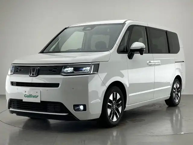 ホンダ ステップワゴン eHEV エアー 愛知県 2023(令5)年 0.9万km プラチナホワイトパール 純正８型ナビ　両側パワスラ　禁煙　ホンダセンシング　バックカメラ　フルセグ　ＤＶＤ　ドラレコ　ＥＴＣ　両側パワスラ　衝突軽減　レーンキープ　誤発進抑制　ＬＥＤオートライト　純正ＡＷ　プッシュスタート