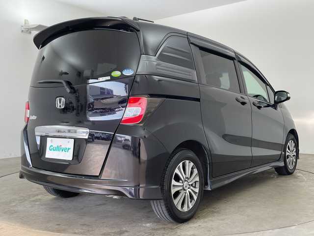 ホンダ フリード スパイク G エアロ 兵庫県 2011(平23)年 4.9万km プレミアムブラキッシュパール ・社外ナビ（AVIC-ZH07）/TV/CD/DVD/Bluetooth/SD/・バックカメラ/・助手席側パワースライドドア/・HIDヘッドライト/・オートライト/・純正15インチアルミホイール/・横滑り防止装置