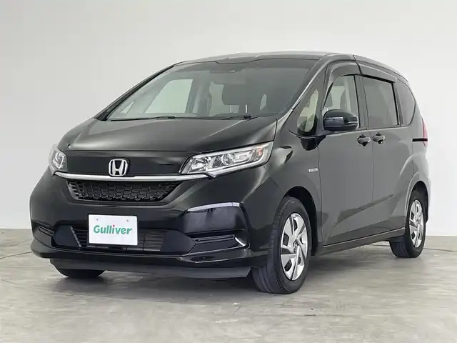 ホンダ フリード ハイブリット G ホンダセンシング 群馬県 2020(令2)年 5.5万km クリスタルブラックパール 社外７インチナビ　バックカメラ　レーダークルーズコントロール　レーンキープアシスト　衝突軽減ブレーキ　両側パワースライドドア　ＬＥＤヘッドライト　オートライト　ビルトインＥＴＣ　コーナーセンサー