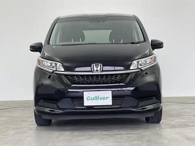 ホンダ フリード ハイブリット G ホンダセンシング 群馬県 2020(令2)年 5.5万km クリスタルブラックパール 社外７インチナビ　バックカメラ　レーダークルーズコントロール　レーンキープアシスト　衝突軽減ブレーキ　両側パワースライドドア　ＬＥＤヘッドライト　オートライト　ビルトインＥＴＣ　コーナーセンサー