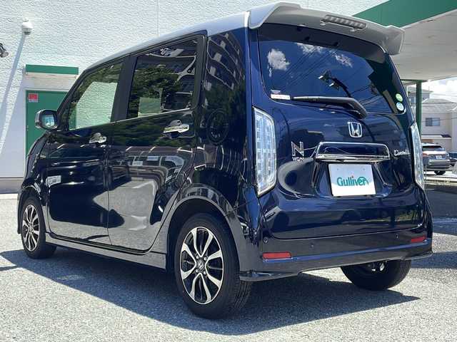 ホンダ Ｎ ＷＧＮ カスタム L ホンダセンシング 大阪府 2020(令2)年 3.2万km ミッドナイトブルービームM ワンオーナー/純正メモリナビ(VXU-207NBi)/・AM/FM/CD/DVD/Bluetooth/・フルセグテレビ/ETC/ドライブレコーダー/クルーズコントロール/衝突軽減ブレーキ/レーンキープアシスト/横滑り防止装置/盗難防止装置/電動パーキングブレーキ/コーナーセンサー/シートヒーター（D席+N席）/LEDヘッドライト/オートマチックハイビーム/オートライト/オートエアコン/プッシュスタートボタン/スマートキー×2/ステアリングリモコン/純正14インチアルミホイール/12V充電器/USBジャック/純正フロアマット/保証書/取扱説明書
