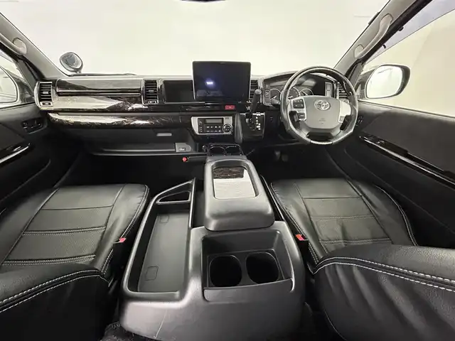 トヨタ ハイエース GL 道央・札幌 2019(令1)年 5.3万km ブラックマイカ ・ワンオーナー/・４WD/・寒冷地仕様/・FLEX仕様/・ALPINE11インチフローディングナビ/　CD/DVD/SD/BT/フルセグ/・ALPINEフリップダウンモニター/・バックカメラ/・ビルトインETC/・衝突軽減ブレーキ/・レーンアシスト/・オートハイビーム/・BARBERO17インチAW/・415コブラ製ステアリング/・415コブラ製内装パネル/・415コブラ製LEDテールレンズ/・Valenti製ハイマウント/・ナスカホワイトレタータイヤ/・FLEX製シートカバー、フロアマット/・FLEX製ベッドキット、テーブルフロア加工/・リアヒーター＆クーラー/・プッシュスタート/・スマートキー/・新車時保証書/・取扱説明書