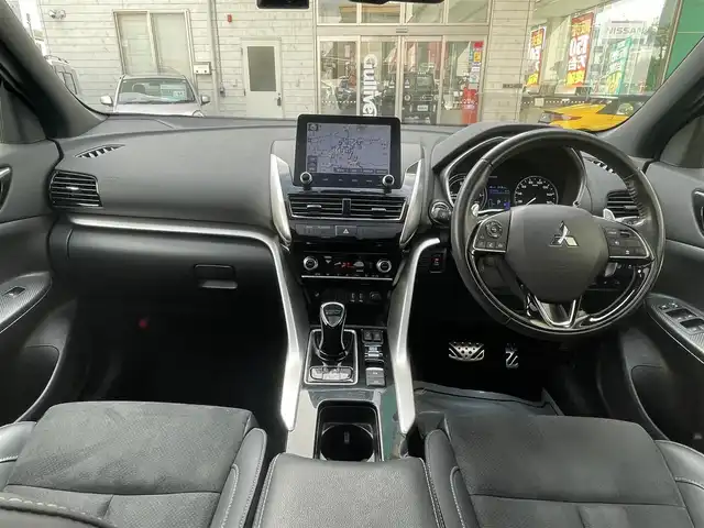 三菱 エクリプス クロス ＰＨＥＶ P 東京都 2021(令3)年 4.4万km パール ワンオーナー/e-アシスト（衝突回避パッケージ）/純正SDナビ フルセグTV/全周囲カメラ　バックカメラ/サンルーフ/ブラックハーフレザーシート/シートヒーター（前席）/パワーシート（D席）/ステアリングヒーター/ヘッドアップディスプレイ/レーダークルーズコントロール/車線逸脱警報システム/誤発進抑制機能/後側方車両検知システム/後退時車両検知システム/パドルシフト/AC1500Wコンセント/スペアキー/保証書＆取扱説明書