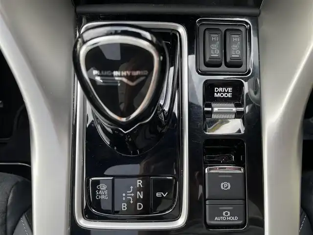三菱 エクリプス クロス ＰＨＥＶ P 東京都 2021(令3)年 4.4万km パール ワンオーナー/e-アシスト（衝突回避パッケージ）/純正SDナビ フルセグTV/全周囲カメラ　バックカメラ/サンルーフ/ブラックハーフレザーシート/シートヒーター（前席）/パワーシート（D席）/ステアリングヒーター/ヘッドアップディスプレイ/レーダークルーズコントロール/車線逸脱警報システム/誤発進抑制機能/後側方車両検知システム/後退時車両検知システム/パドルシフト/AC1500Wコンセント/スペアキー/保証書＆取扱説明書