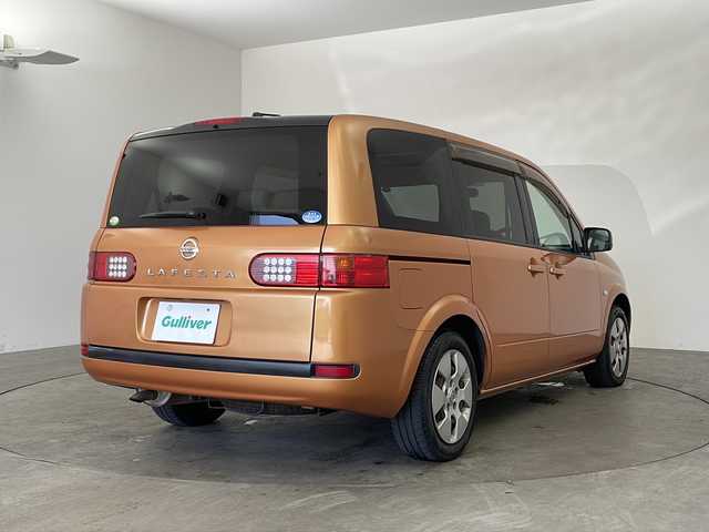 日産 ラフェスタ 20S 兵庫県 2005(平17)年 8.5万km ソレイユオレンジ ・AM/FM/CD/MD/・サンルーフ/・ETC/・ABS/・ハロゲンライト/・リモコンキー/・オートエアコン/・純正フロアマット/・ウォークスルー/・両側スライドドア/・電動格納ミラー/・サイドバイザー/・Wエアバッグ/・保証書/・取扱説明書