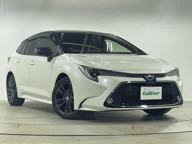 トヨタ カローラツーリング ハイブリッド ダブルバイビー 神奈川県 2021(令3)年 5.4万km ブラックマイカ/ホワイトパールクリスタルシャイン 2トーン ワンオーナー/純正ディスプレイオーディオ/（USB/BT/フルセグTV）/バックカメラ/ハーフレザーシート/前席シートヒーター/PCS/LTA/ACC/PKSB/RSA/LEDヘッドライト/オートライト/オートハイビーム/フォグランプ/電動パーキング/ブレーキオートホールド/前方ドライブレコーダー/プッシュスタート/スマートキー/純正17インチアルミホイール/新車時保証書/取扱説明書/スペアキー