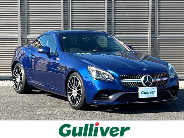 メルセデス・ベンツ ＳＬＣ２００ スポーツ 千葉県 2016(平28)年 5.7万km ブリリアントブルーM 純正ナビ/ワンセグテレビ/バックカメラ/Bluetooth/CD/DVD/USB/ビルトインETC/レダークルーズコントロール/ハーマンカードンサウンド/前方ドライブレコーダー/カーテシライト/オープンカー/ブラインドスポットアシスト/アクティブステアリング/アクティブブレーキ/ABS(アンチロック・ブレーキ・システム)/BAS(ブレーキアシストシステム)/アダクティブブレーキライト/ESP(エレクトロニック・スタビリティ・プログラム)/EBD(電子制御ブレーキングシステム)/盗難防止警報システム/シートヒーター/エアスカーフ/左右メモリー機能付きパワーシート/プッシュスタート/スマートキー/スペアキー１本/アンビエントライト/ステアリングスイッチ/純正アルミホイール/純正フロアマット/取扱説明書/保証書