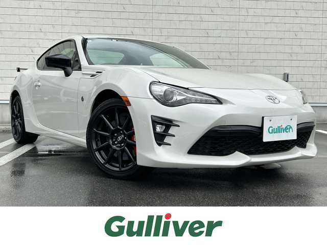 トヨタ ８６ GT リミテッド ブラックPKG 静岡県 2018(平30)年 1.4万km クリスタルホワイトパール 純正SDナビ（AM FM CD DVD Bluetooth）/純正ドライブレコーダー（前）/LEDオートヘッドライト/ハーフレザーシート/シートヒーター/クルーズコントロール/純正17インチアルミホイール/革巻きステアリング/ステアリングスイッチ/スマートキー＆プッシュスタート/フロントフォグランプ/MTモード/寒冷地仕様/純正フロアマット/取扱説明書/保証書/ビークルスタビリティコントロール（横滑り防止）/フルセグTV/バックモニター/ETC
