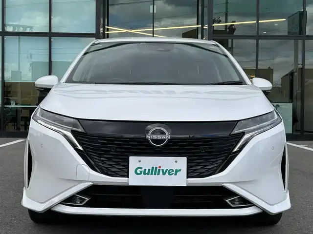 日産 オーラ G レザーエディション 愛媛県 2022(令4)年 4万km ピュアホワイトパール 登録時走行距離：39471km/BOSEスピーカー/メーカーOP純正ナビ/AM/FM/BT/フルセグTV//AppleCarPlay/AndroidAuto/HDMI/USB/ETC2.0/全方位カメラ/前方ドラレコ/追従クルコン/衝突軽減システム/LEDヘッドライト/オートライト/オートハイビーム/エンジンスタートボタン/スマートキー/純正アルミホイール/純正フロアマット/前後コーナーセンサー