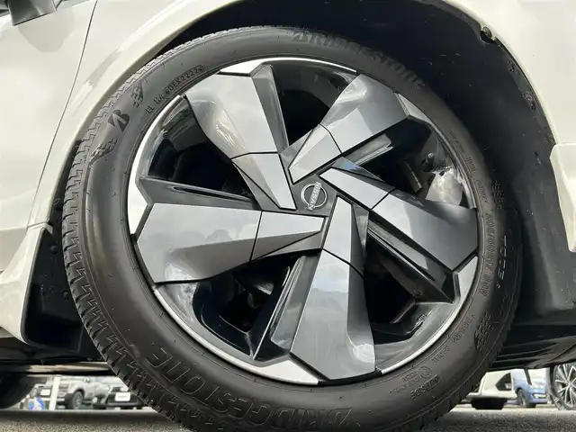 日産 オーラ G レザーエディション 愛媛県 2022(令4)年 4万km ピュアホワイトパール 登録時走行距離：39471km/BOSEスピーカー/メーカーOP純正ナビ/AM/FM/BT/フルセグTV//AppleCarPlay/AndroidAuto/HDMI/USB/ETC2.0/全方位カメラ/前方ドラレコ/追従クルコン/衝突軽減システム/LEDヘッドライト/オートライト/オートハイビーム/エンジンスタートボタン/スマートキー/純正アルミホイール/純正フロアマット/前後コーナーセンサー