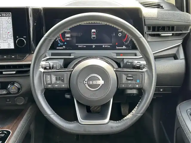 日産 オーラ G レザーエディション 愛媛県 2022(令4)年 4万km ピュアホワイトパール 登録時走行距離：39471km/BOSEスピーカー/メーカーOP純正ナビ/AM/FM/BT/フルセグTV//AppleCarPlay/AndroidAuto/HDMI/USB/ETC2.0/全方位カメラ/前方ドラレコ/追従クルコン/衝突軽減システム/LEDヘッドライト/オートライト/オートハイビーム/エンジンスタートボタン/スマートキー/純正アルミホイール/純正フロアマット/前後コーナーセンサー