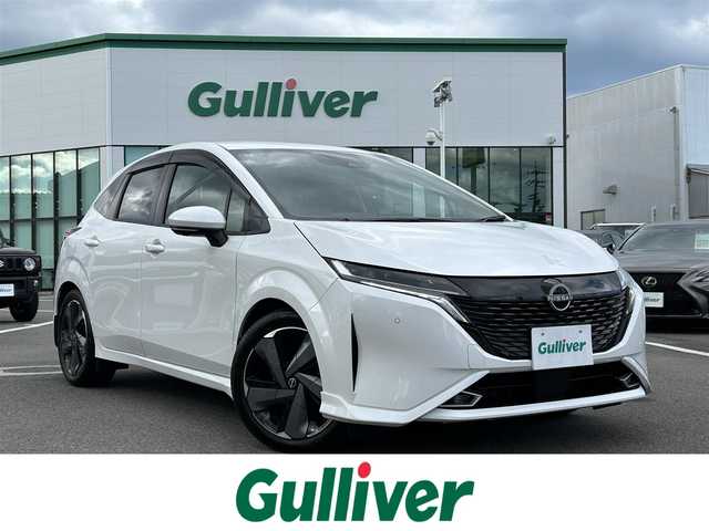 日産 オーラ G レザーエディション 愛媛県 2022(令4)年 4万km ピュアホワイトパール 登録時走行距離：39471km/BOSEスピーカー/メーカーOP純正ナビ/AM/FM/BT/フルセグTV//AppleCarPlay/AndroidAuto/HDMI/USB/ETC2.0/全方位カメラ/前方ドラレコ/追従クルコン/衝突軽減システム/LEDヘッドライト/オートライト/オートハイビーム/エンジンスタートボタン/スマートキー/純正アルミホイール/純正フロアマット/前後コーナーセンサー