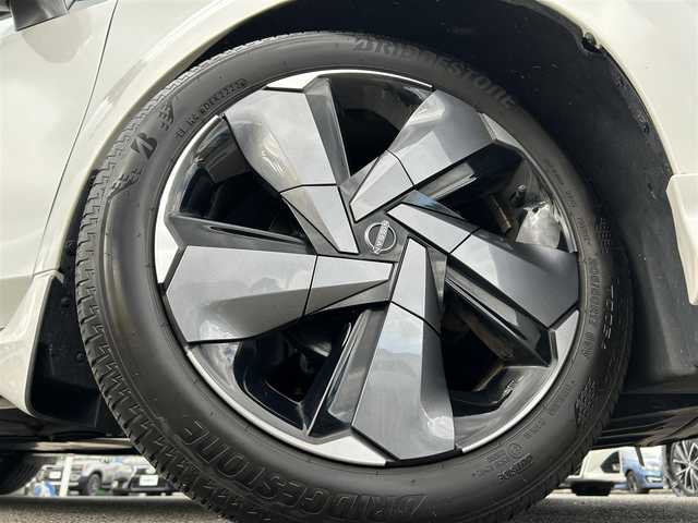 日産 オーラ G レザーエディション 愛媛県 2022(令4)年 4万km ピュアホワイトパール 登録時走行距離：39471km/BOSEスピーカー/メーカーOP純正ナビ/AM/FM/BT/フルセグTV//AppleCarPlay/AndroidAuto/HDMI/USB/ETC2.0/全方位カメラ/前方ドラレコ/追従クルコン/衝突軽減システム/LEDヘッドライト/オートライト/オートハイビーム/エンジンスタートボタン/スマートキー/純正アルミホイール/純正フロアマット/前後コーナーセンサー