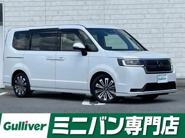 ホンダ ステップワゴン スパーダ eHEV プレミアムライン 福岡県 2022(令4)年 0.8万km プラチナホワイトパール 純正11型SDナビ(フルセグTV/CD/DVD/BT)全方位モニターホンダセンシングコーナーセンサーレーダークルコン両側パワスラETCシートヒーターオットマンUSBポート純正LEDヘッドライト純正フロアマット純正アルミホイール17インチスマートキープッシュスタート