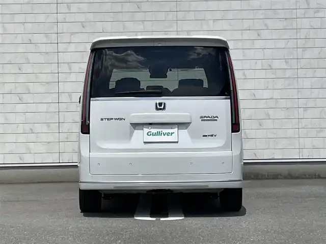 ホンダ ステップワゴン スパーダ eHEV プレミアムライン 福岡県 2022(令4)年 0.8万km プラチナホワイトパール 純正11型SDナビ(フルセグTV/CD/DVD/BT)全方位モニターホンダセンシングコーナーセンサーレーダークルコン両側パワスラETCシートヒーターオットマンUSBポート純正LEDヘッドライト純正フロアマット純正アルミホイール17インチスマートキープッシュスタート