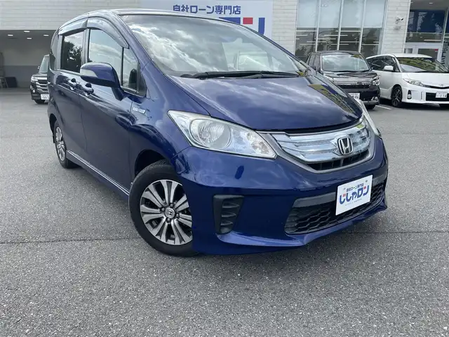 ホンダ フリード ハイブリット ジャストセレクション 東京都 2013(平25)年 4.6万km 紺 (株)IDOMが運営する【じしゃロン昭島店】の自社ローン専用車両になります。こちらは現金またはオートローンご利用時の価格です。自社ローンご希望の方は別途その旨お申付け下さい/純正ナビ/BT/TV/SD/CD/DVD/バックカメラ/ビルトインETC/スマートキー/両側パワースライドドア/ドライブレコーダー/クルーズコントロール/ステアリングスイッチ/シートリフター/電動格納ドアミラー/ウィンカーミラー/純正アルミホイール/純正フロアマット