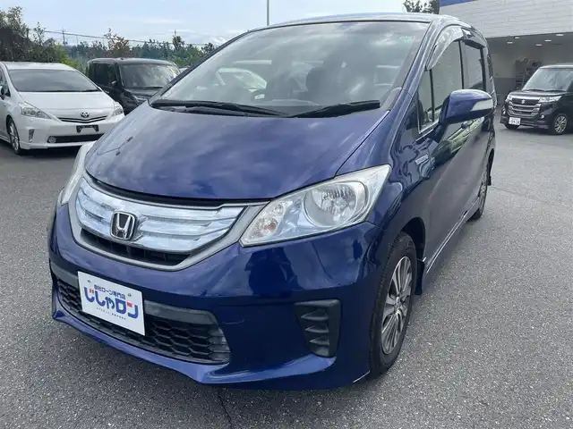 ホンダ フリード ハイブリット ジャストセレクション 東京都 2013(平25)年 4.6万km 紺 (株)IDOMが運営する【じしゃロン昭島店】の自社ローン専用車両になります。こちらは現金またはオートローンご利用時の価格です。自社ローンご希望の方は別途その旨お申付け下さい/純正ナビ/BT/TV/SD/CD/DVD/バックカメラ/ビルトインETC/スマートキー/両側パワースライドドア/ドライブレコーダー/クルーズコントロール/ステアリングスイッチ/シートリフター/電動格納ドアミラー/ウィンカーミラー/純正アルミホイール/純正フロアマット