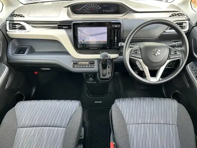 スズキ ソリオ HV MX 奈良県 2022(令4)年 0.5万km スピーディーブルーM 9インチ純正ナビ /全方位カメラ /片側パワースライドドア /フルセグTV /ビルトインETC /レーダークルーズコントロール /前席シートヒーター /LEDヘッドライト /衝突被害軽減システム /リアサンシェード