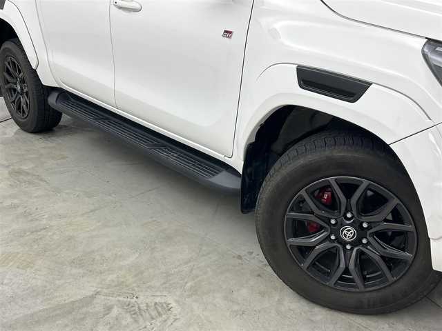 トヨタ ハイラックス Z GRスポーツ 福岡県 2021(令3)年 3.8万km スーパーホワイトⅡ 純正ＤＡナビ　/全方位カメラ　/セーフティセンス　/レーダークルーズコントロール　/パドルシフト　/ハードトノカバー　/ドライブレコーダー/ＥＴＣ　/パワーヒーター　/パワーシート　/ハーフレザーシート　/デュアルオートエアコン