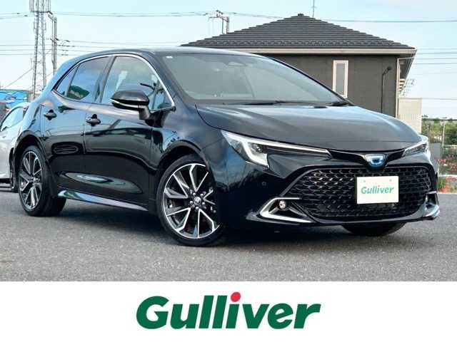 トヨタ カローラ スポーツ ハイブリッドG Z 千葉県 2023(令5)年 1.9万km アティチュードブラックマイカ 純正ディスプレイオーディオ/Bluetooth/AM/FM/Miracast/バックカメラ/ETC/プリクラッシュセーフティ/レーンディパーチャアラート/ロードサインアシスト/プロアクティブドライビングアシスト/パーキングサポートブレーキ/レーダークルーズコントロール/オートハイビーム/プッシュスタート/スマートキー/前席シートヒーター/純正18インチアルミホイール/純正フロアマット/保証書・取扱説明書