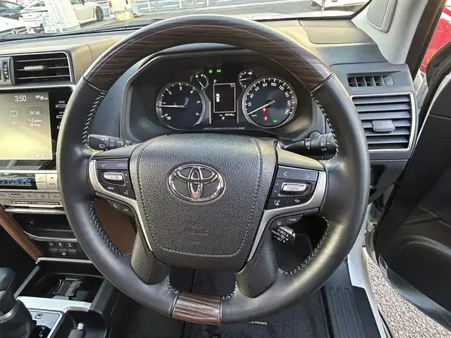 トヨタ ランドクルーザー プラド TX-L 70thアニバーサリーLTD 愛知県 2021(令3)年 4万km ホワイトパールクリスタルシャイン ワンオーナー/メーカーナビ/(FM/AM/BT/USB/Miracast/フルセグ)/全方位カメラ/サンルーフ/トヨタセーフティーセンス/ ・プリクラッシュセーフティー/ ・レーンディーパーチャーアラート/ ・ブラインドスポットモニター/ ・ロードサインアシスト/ ・クリアランスソナー/ ・レーダークルーズコントロール/ ・パーキングサポートブレーキ/特別仕様車/4WD/ディーゼル/バックカメラ/ETC2.0/レザーシート/パワーシート/シートヒーター/エアシート/ドライブレコーダー/LEDヘッドライト/フォグランプ/純正AW18インチ/電動格納ミラー/純正フロアマット/ステップ/プッシュスタート/スマートキー/ステアリングリモコン/ハンズフリー/ABS/取扱説明書・保証書