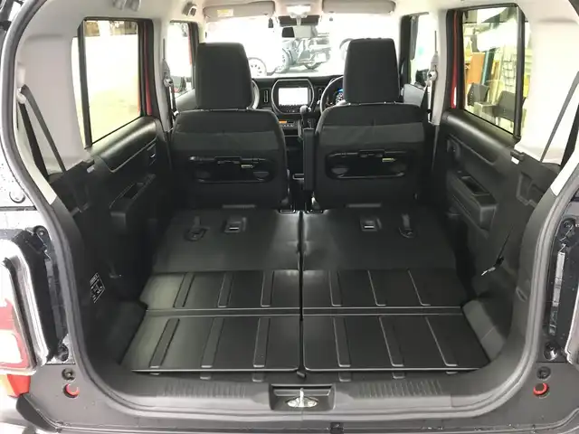 スズキ ハスラー タフワイルド・ターボ 和歌山県 2025(令7)年 0.1万km オレンジⅡ 走行距離　580km（登録時）/純正8インチナビ（CN-HZ8A5)/（AM、FM、CD、DVD、Bluetooth、USB、TV）/スズキセーフティーサポート/・デュアルカメラブレーキ/・車線逸脱抑制機能/・ハイビームアシスト/・アダプティブクルーズコントロール/・誤発進抑制機能/・リアパーキングセンサー/純正前後ドライブレコーダー/LEDヘッドライト/前席シートヒーター/純正15インチホイール/パーソナルテーブル/荷室内アクセサリーソケット/電動格納ミラー/ステアリングスイッチ/プッシュスタート/取扱説明書/保証書