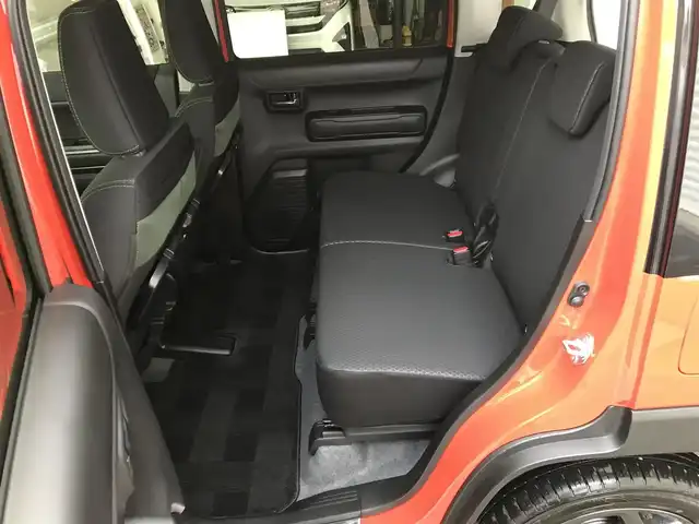 スズキ ハスラー タフワイルド・ターボ 和歌山県 2025(令7)年 0.1万km オレンジⅡ 走行距離　580km（登録時）/純正8インチナビ（CN-HZ8A5)/（AM、FM、CD、DVD、Bluetooth、USB、TV）/スズキセーフティーサポート/・デュアルカメラブレーキ/・車線逸脱抑制機能/・ハイビームアシスト/・アダプティブクルーズコントロール/・誤発進抑制機能/・リアパーキングセンサー/純正前後ドライブレコーダー/LEDヘッドライト/前席シートヒーター/純正15インチホイール/パーソナルテーブル/荷室内アクセサリーソケット/電動格納ミラー/ステアリングスイッチ/プッシュスタート/取扱説明書/保証書