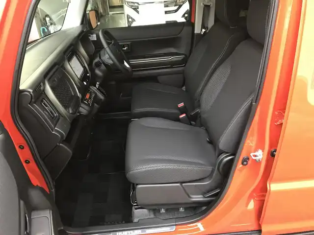 スズキ ハスラー タフワイルド・ターボ 和歌山県 2025(令7)年 0.1万km オレンジⅡ 走行距離　580km（登録時）/純正8インチナビ（CN-HZ8A5)/（AM、FM、CD、DVD、Bluetooth、USB、TV）/スズキセーフティーサポート/・デュアルカメラブレーキ/・車線逸脱抑制機能/・ハイビームアシスト/・アダプティブクルーズコントロール/・誤発進抑制機能/・リアパーキングセンサー/純正前後ドライブレコーダー/LEDヘッドライト/前席シートヒーター/純正15インチホイール/パーソナルテーブル/荷室内アクセサリーソケット/電動格納ミラー/ステアリングスイッチ/プッシュスタート/取扱説明書/保証書