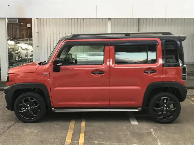 スズキ ハスラー タフワイルド・ターボ 和歌山県 2025(令7)年 0.1万km オレンジⅡ 走行距離　580km（登録時）/純正8インチナビ（CN-HZ8A5)/（AM、FM、CD、DVD、Bluetooth、USB、TV）/スズキセーフティーサポート/・デュアルカメラブレーキ/・車線逸脱抑制機能/・ハイビームアシスト/・アダプティブクルーズコントロール/・誤発進抑制機能/・リアパーキングセンサー/純正前後ドライブレコーダー/LEDヘッドライト/前席シートヒーター/純正15インチホイール/パーソナルテーブル/荷室内アクセサリーソケット/電動格納ミラー/ステアリングスイッチ/プッシュスタート/取扱説明書/保証書