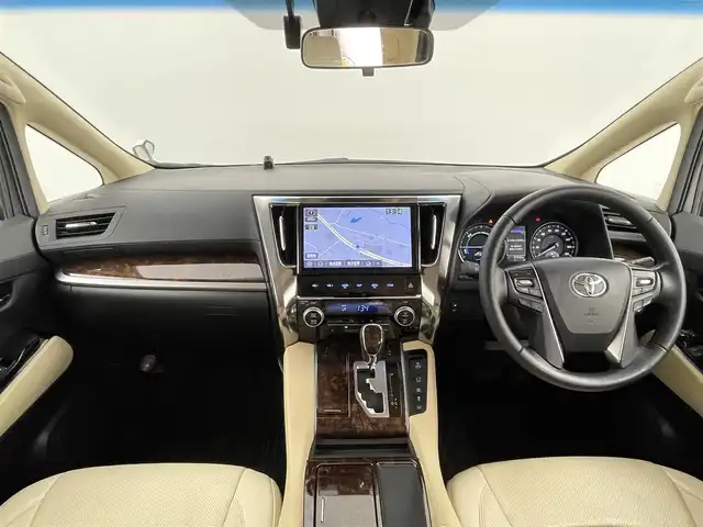 トヨタ アルファードハイブリット X 千葉県 2019(令1)年 5.8万km ホワイトパールクリスタルシャイン 禁煙車/モデリスタエアロ（F/S/R）/純正１０型ナビ（NSZN-Z68T）/AM＆FM＆Bluetooth＆フルセグTV＆CD＆DVD/両側電動スライドドア　/トヨタセーフティセンス　/プリクラッシュセーフティ/レーダークルーズコントロール　/ビルトインＥＴＣ/レザー調シートカバー（ベージュ）　/１００Ｖ電源　/純正フロアマット　/ＬＥＤヘッドライト/バックカメラ/アイドリングストップ/ウィンカーミラー/ドアバイザー/プッシュスタート