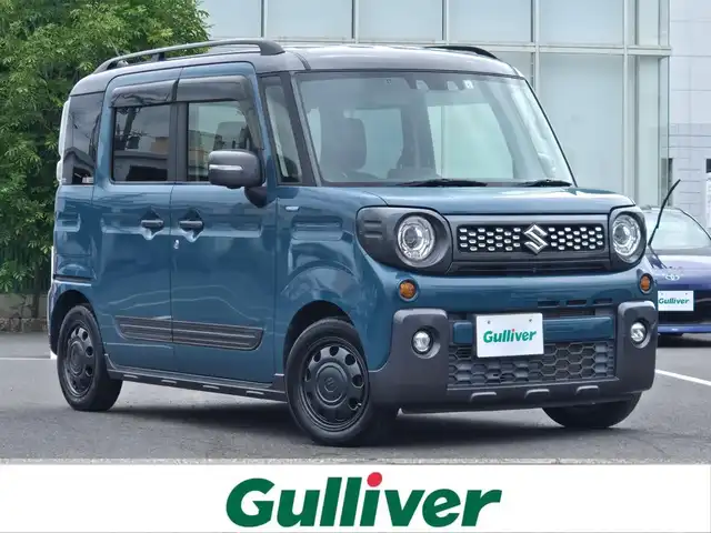 スズキ スペーシア ギア HYBRID XZ 鹿児島県 2021(令3)年 4.3万km デニムブルー ガンメタリック 2トーン ヘッドアップディスプレイ　/レーダークルーズコントロール/３６０°ビューカメラ　/ＥＴＣ　/両側パワースライドドア　/デュアルカメラブレーキサポート　/純正ＳＤナビ（ＣＮ－ＲＺ８６６）　/D+N席シートヒーター/ワンオーナー/ルーフレール/Bluetoothオーディオ/純正アルミホイール(14インチ)/フルセグテレビ/前後コーナーセンサー/LEDヘッドライト/レーンキープアシスト/横滑り防止装置/プッシュスタート/スマートキー/エアバッグ(W+サイド)