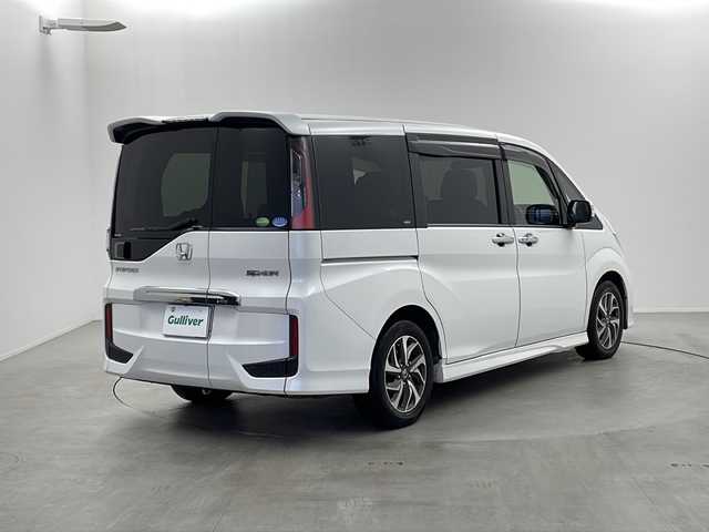 ホンダ ステップワゴン スパーダ ホンダセンシング 栃木県 2016(平28)年 16.4万km ホワイトオーキッドパール 純正９インチナビ　VXM-135VFNi/（CD/DVD/FM/AM/USB/SD)/バックカメラ/ホンダセンシング/●衝突軽減ブレーキ〈CMBS〉/●ACC〈アダプティブ・クルーズ・コントロール〉/●LKAS〈車線維持支援システム〉/●路外逸脱抑制機能/●誤発進抑制機能/●先行車発進お知らせ機能/●標識認識機能/純正ETC/純正ドライブレコーダー/横滑り防止装置/両側パワースライドドア/電動格納ミラー/ステアリングリモコン