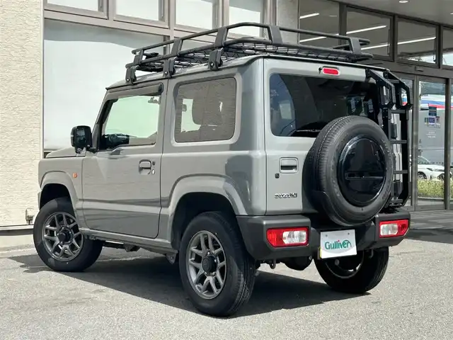 スズキ ジムニー XC 大阪府 2024(令6)年 0.6万km ミディアムグレー ワンオーナー/純正ディスプレイオーディオ/バックカメラ/レーンキープアシスト/衝突軽減システム/横滑り防止システム/クルーズコントロール/ヒーテッドミラー/シートヒーター/純正１６インチAW/ドライブレコーダー前後/ETC/保証書/取扱説明書/スペアキー
