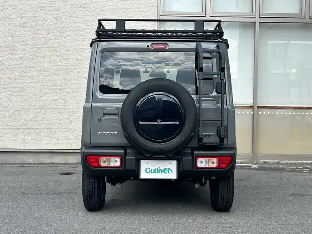 スズキ ジムニー XC 大阪府 2024(令6)年 0.6万km ミディアムグレー ワンオーナー/純正ディスプレイオーディオ/バックカメラ/レーンキープアシスト/衝突軽減システム/横滑り防止システム/クルーズコントロール/ヒーテッドミラー/シートヒーター/純正１６インチAW/ドライブレコーダー前後/ETC/保証書/取扱説明書/スペアキー