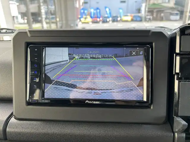 スズキ ジムニー XC 大阪府 2024(令6)年 0.6万km ミディアムグレー ワンオーナー/純正ディスプレイオーディオ/バックカメラ/レーンキープアシスト/衝突軽減システム/横滑り防止システム/クルーズコントロール/ヒーテッドミラー/シートヒーター/純正１６インチAW/ドライブレコーダー前後/ETC/保証書/取扱説明書/スペアキー