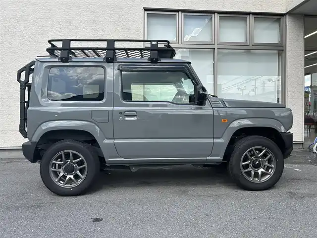 スズキ ジムニー XC 大阪府 2024(令6)年 0.6万km ミディアムグレー ワンオーナー/純正ディスプレイオーディオ/バックカメラ/レーンキープアシスト/衝突軽減システム/横滑り防止システム/クルーズコントロール/ヒーテッドミラー/シートヒーター/純正１６インチAW/ドライブレコーダー前後/ETC/保証書/取扱説明書/スペアキー