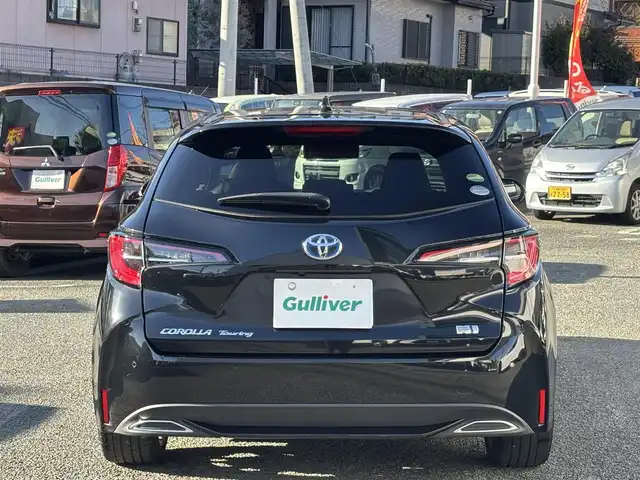 トヨタ カローラツーリング ハイブリッド ダブルバイビー 熊本県 2020(令2)年 4.1万km ブラックマイカ 純正ディスプレイオーディオ/【Bluetooth再生/USB】/バックカメラ/レーダークルーズコントロール/レーントレーシングアシスト/プリクラッシュセーフティ/クリアランスソナー/パーキングサポートブレーキ/ロードサインアシスト/純正17インチAW/オートハイビーム/LEDオートライト/フォグライト/ETC/保証書/取扱説明書/スペアキー