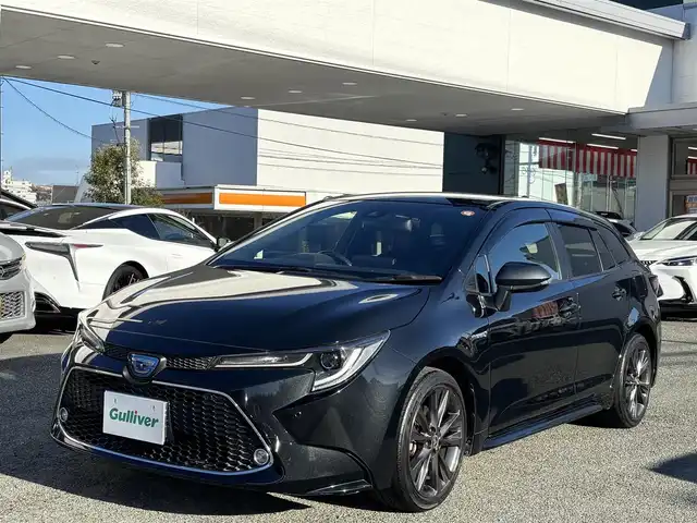 トヨタ カローラツーリング ハイブリッド ダブルバイビー 熊本県 2020(令2)年 4.1万km ブラックマイカ 純正ディスプレイオーディオ/【Bluetooth再生/USB】/バックカメラ/レーダークルーズコントロール/レーントレーシングアシスト/プリクラッシュセーフティ/クリアランスソナー/パーキングサポートブレーキ/ロードサインアシスト/純正17インチAW/オートハイビーム/LEDオートライト/フォグライト/ETC/保証書/取扱説明書/スペアキー