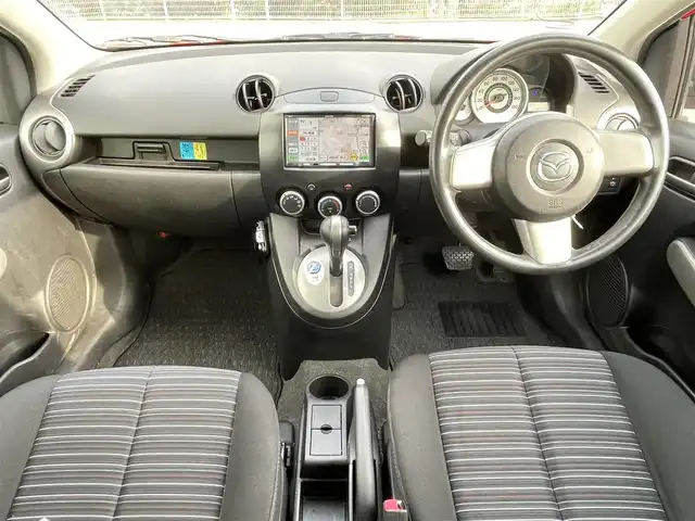 マツダ デミオ 13C－V 大阪府 2009(平21)年 7.3万km トゥルーレッド 社外ナビ/社外１４インチアルミ/オートライト/ＥＴＣ/純正マット