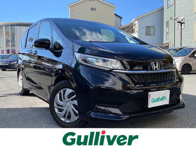 ホンダ フリード G ホンダセンシング 大阪府 2020(令2)年 0.9万km クリスタルブラックパール ワンオーナー/純正メモリナビ/・AM/FM/Bluetooth/・フルセグテレビ/バックカメラ/ビルトインETC/ドライブレコーダー/クルーズコントロール/衝突軽減ブレーキ/レーンキープアシスト/アイドリングストップ/横滑り防止装置/両側パワースライド/シートヒーター（D席+N席）/LEDヘッドライト/オートライト/オートエアコン/プッシュスタートボタン/スマートキー/ステアリングリモコン/純正17インチアルミホイール/USBジャック/純正フロアマット/保証書/取扱説明書