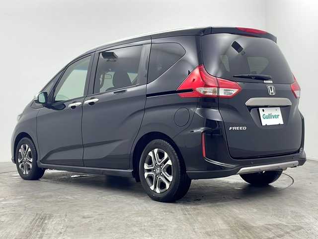 ホンダ フリード クロスター ホンダセンシング 大阪府 2022(令4)年 1.8万km クリスタルブラックパール KENWOOD7インチナビ/・バックカメラ/・フルセグテレビ/DVD/・CD/BT/AM/FM/両側パワースライドドア　　/レーダークルーズコントロール　　/ルーフレール　/純正ＬＥＤライト/フォグライト　/コーナーセンサー/レーンアシスト/横滑り防止装置/ハーフレザーシート　/シートヒーター/ステアリングリモコン/スペアキー1本