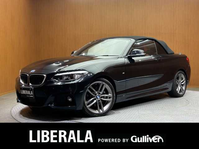ＢＭＷ ２２０ｉ カブリオレ ラグジュアリー 千葉県 2018(平30)年 2.7万km 黒Ｍ ＡＣＣ　/赤革シート　/ナビ　/Ｂｌｕｅｔｏｏｔｈ接続　/Ｂカメラ　/電動シート　/シートＨ　/パークディスタンス　/コンフォートアクセス　/ドライビングアシスト　/アダブティブＬＥＤヘッドライト　/衝突軽減Ｂ　/ＬＫＳ